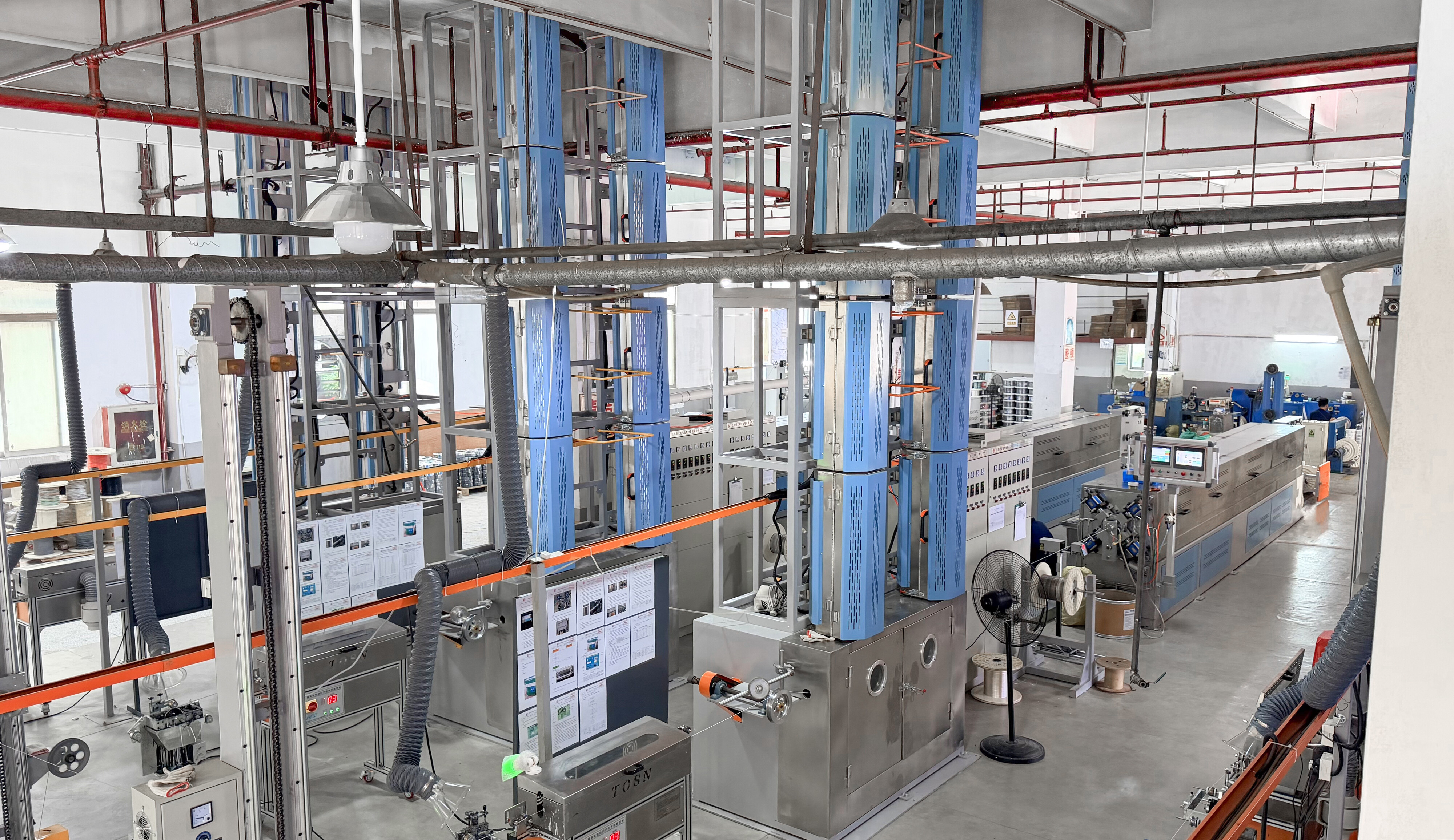 Sintering Tower Cluster: Aerial view of a vertical sintering tower array